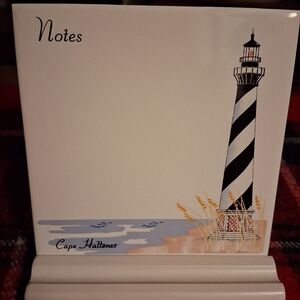 Lighthouse, porcelain tile and stand designed by S. Hanner, limited.